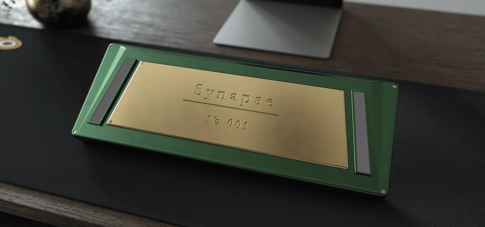 The underside of Synapse: a brass weight engraved Synapse Nº 001
